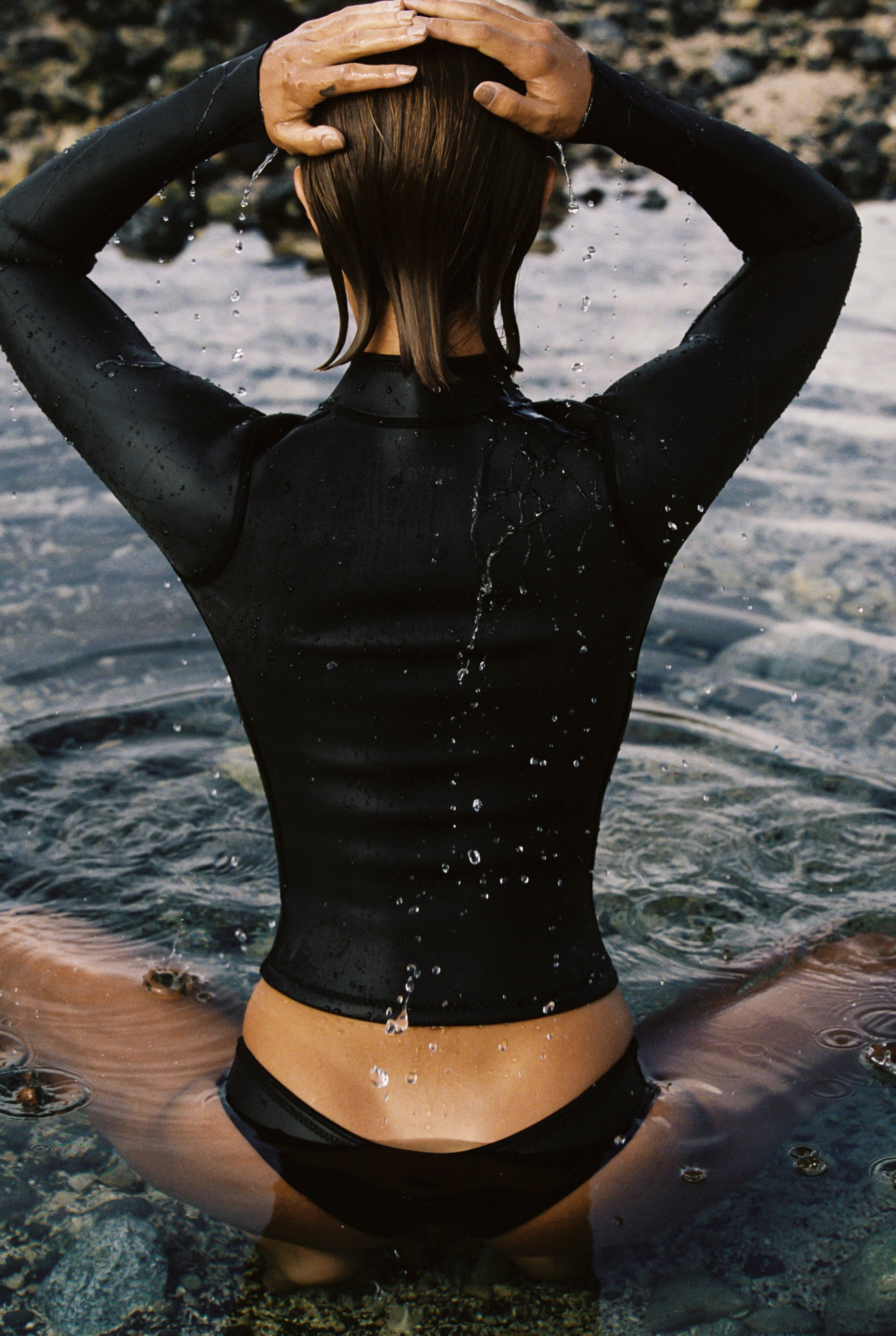 Rell Vest  black smoothie from 2 mm Yamamoto limestone based  neoprene made for a good session in the Ocean.