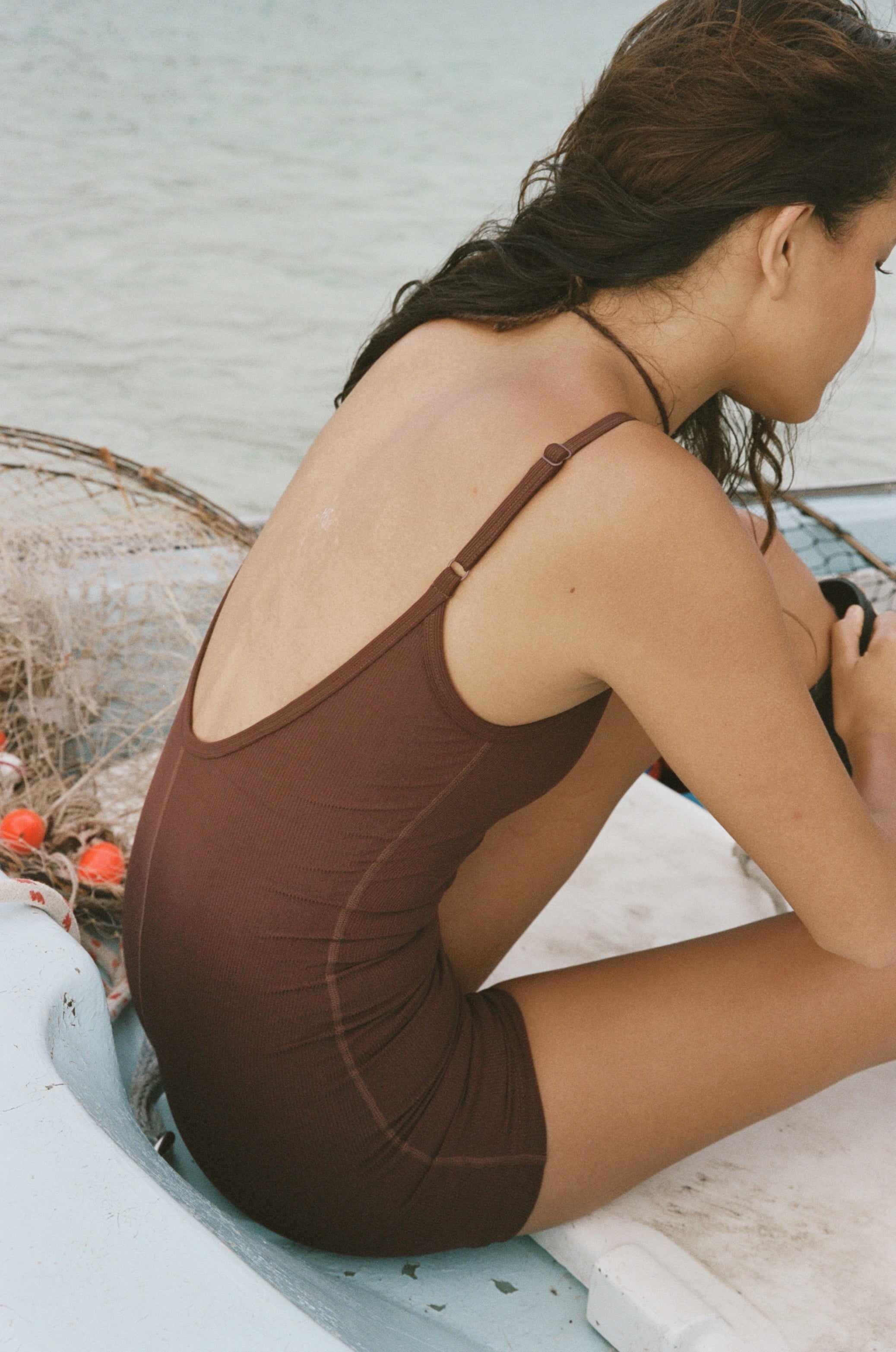 'Hawkins' bodysuit, a stylish blend of retro design and practicality, perfect for ocean dips and catching waves.