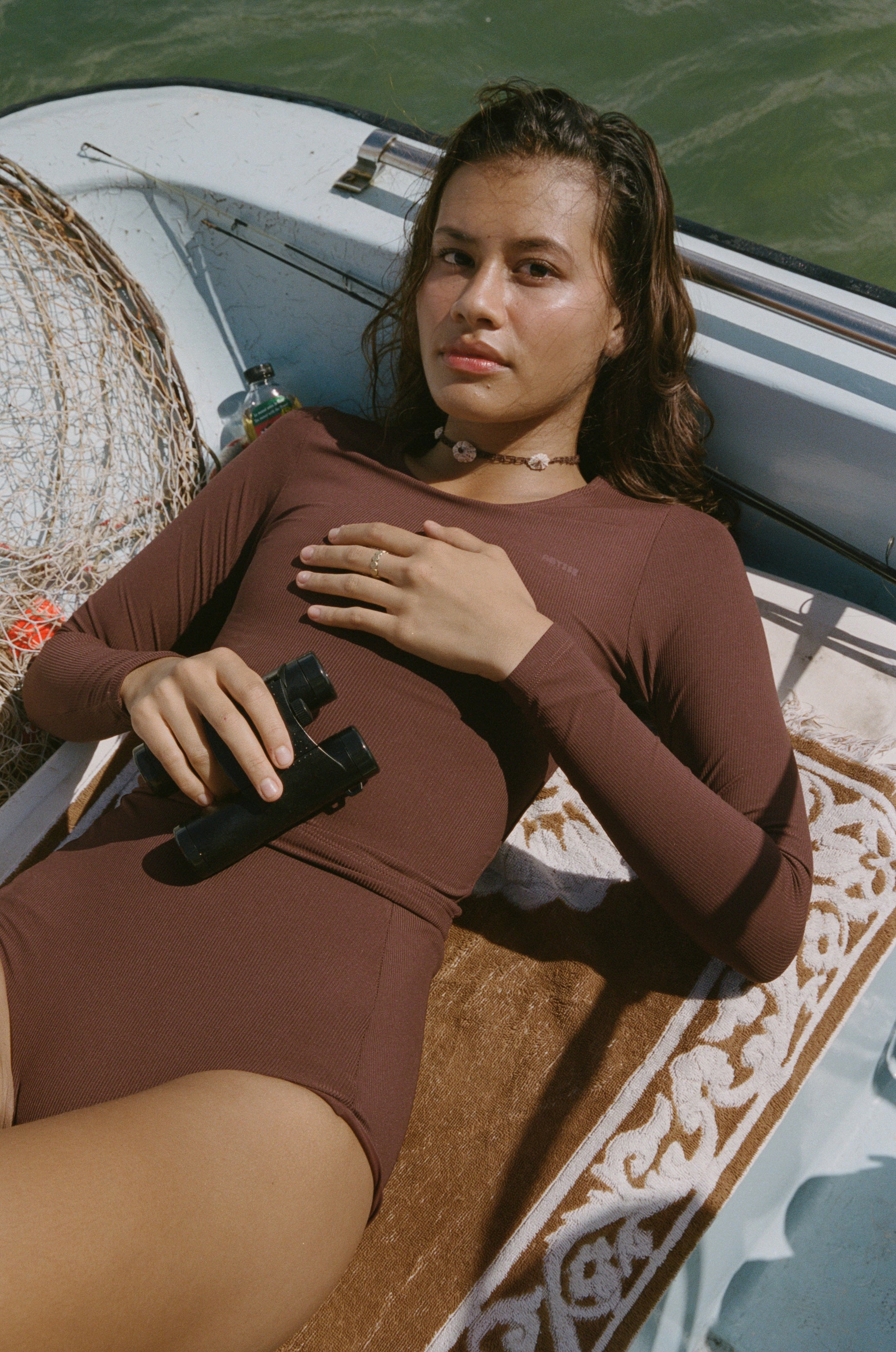 The Poppler is our new long sleeve cropped rash-guard top. A second-skin, full-coverage silhouette that is perfect for roaming the ocean while being protected from the sun. 