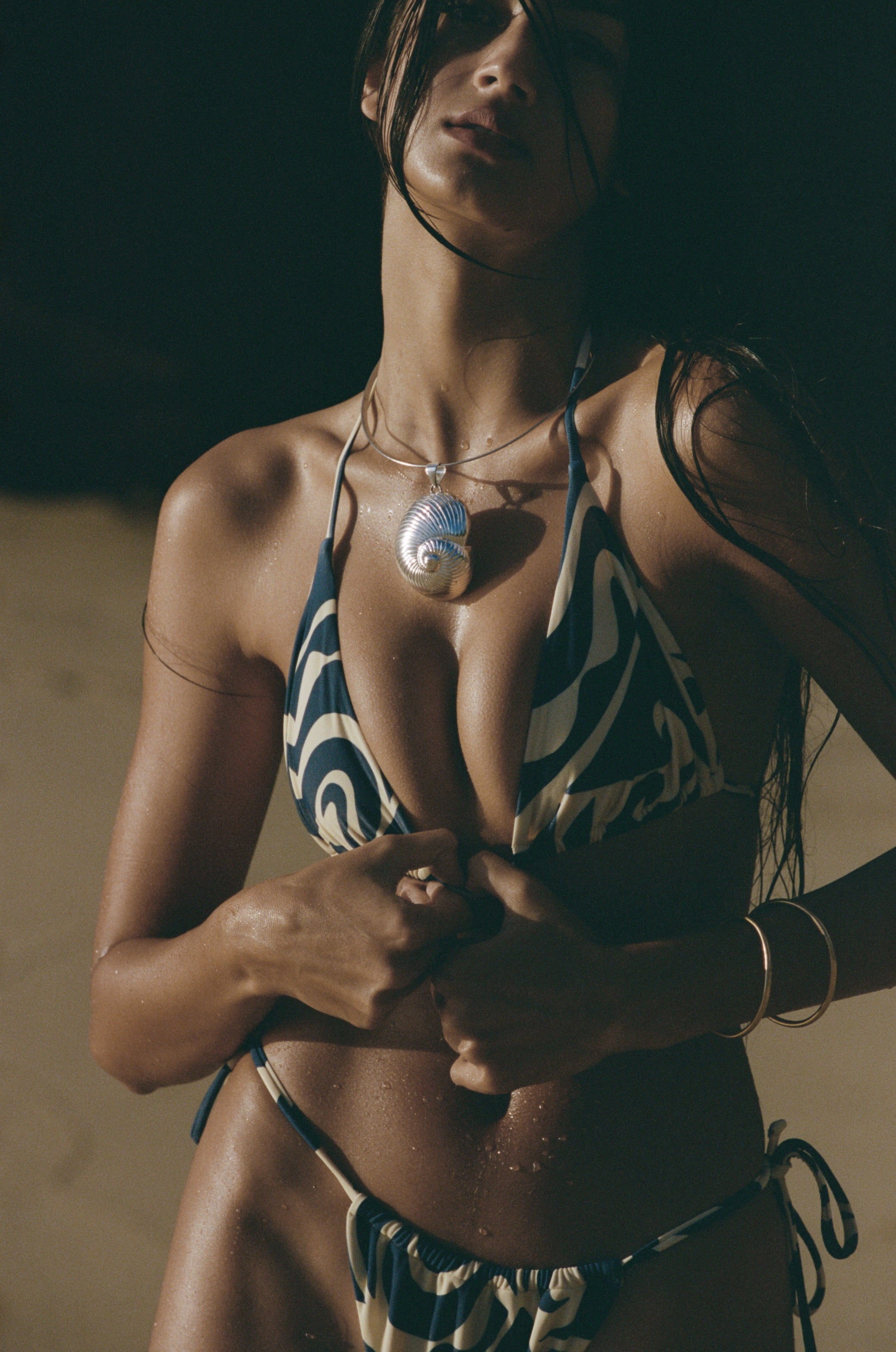 The Maya Top is a classic triangle top made with recycled fabric that is double lined for greater durability and comfort.